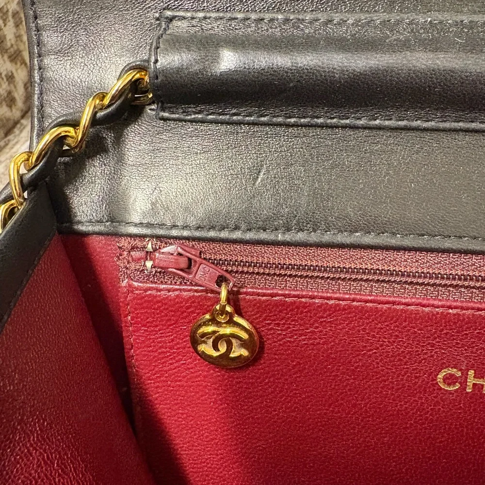 CHANEL Black Quilted Lambskin Flap Bag with Gold Chain